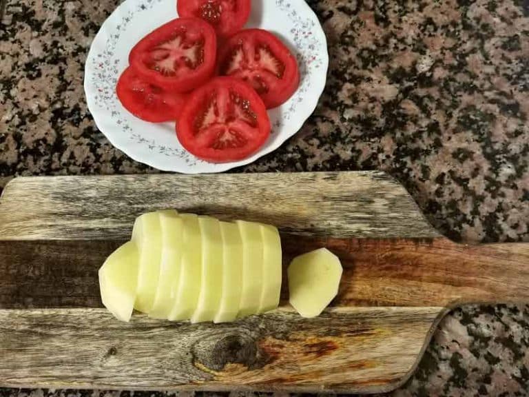 Corta patatas tomate